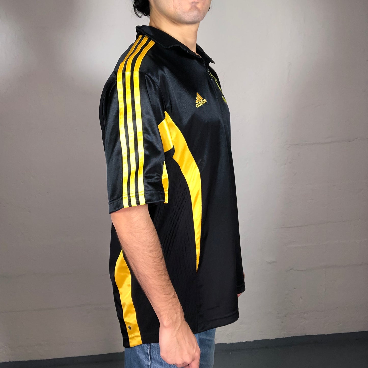 Vintage 90’s Sporty Football Style Black Sheer Archive Adidas T-Shirt with Yellow Stripes and Back Lola Print (M)